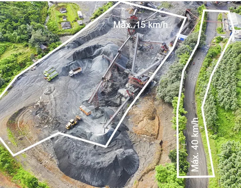 Foto aérea de operação de mineração com cercas eletrônicas desenhadas e limites de velocidade por área